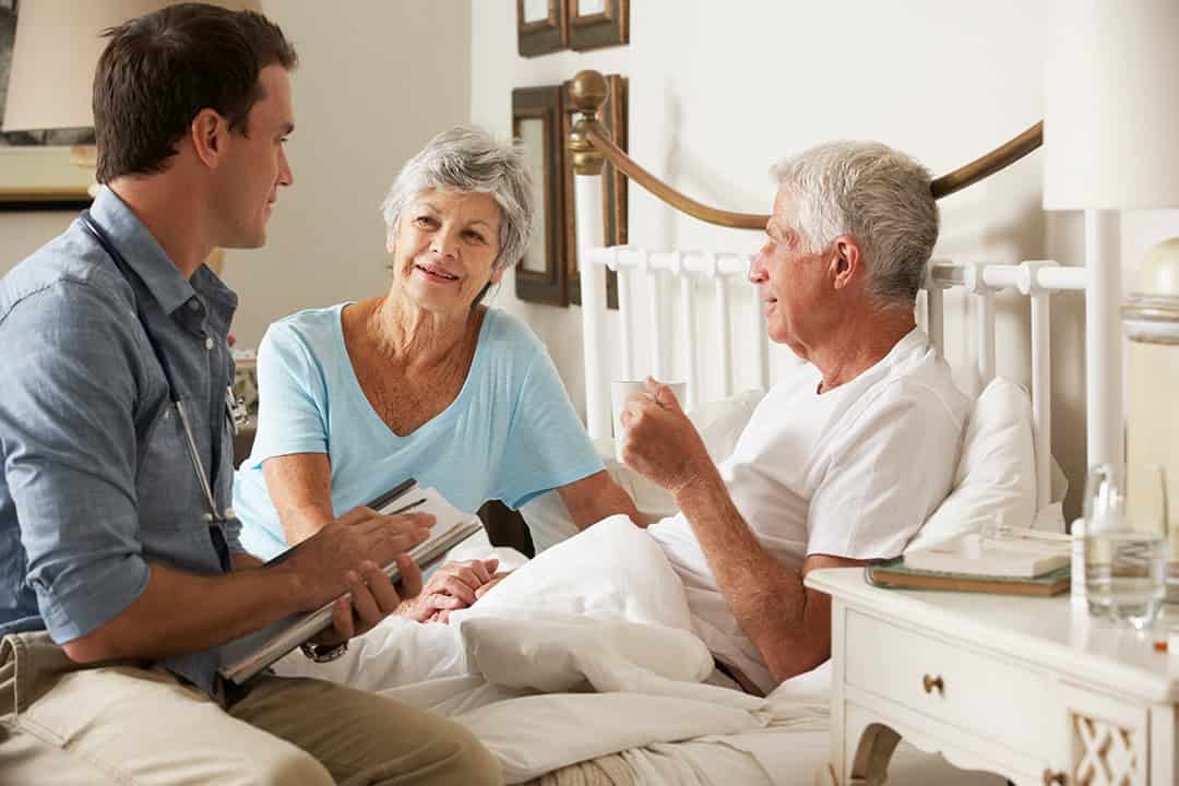 Close-up of the hands of a health volunteer next to those of an elderly woman. Concept of care. Aging concept. Volunteering concept.